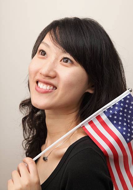 istock woman with an USA flag 104697088