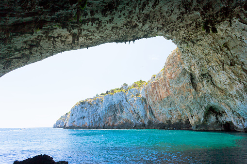 Apulia, Grotta Zinzulusa, Italy - Standing under the impressive cave arch at the grotto of Zinzulusa