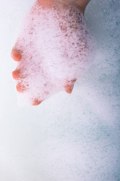 istock Child washing hands  in foam 1046977422