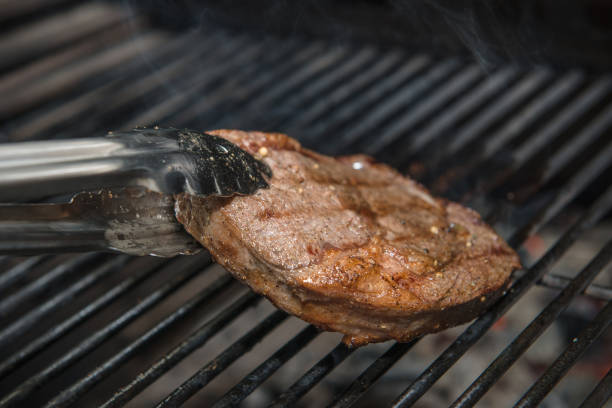 Steak Ribeye Being Prepared in Josper stock photo