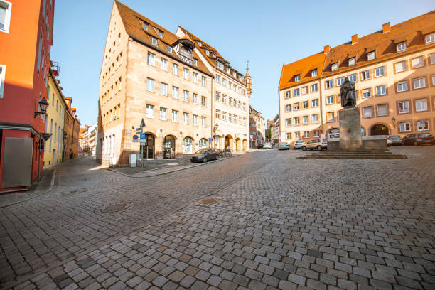 istock Square with monument in Nurnberg city, Germany 1046983316