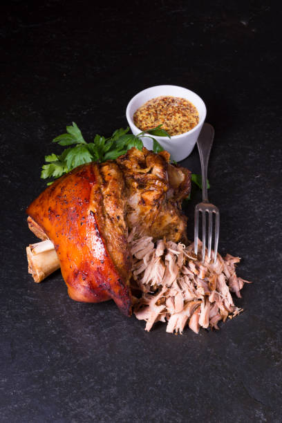 istock crispy fried Bavarian pork knuckle with soft meat 1046991898