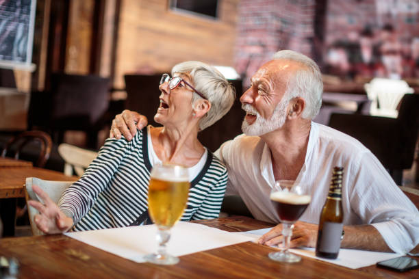 istock Senior couple drinking beer 1047001808