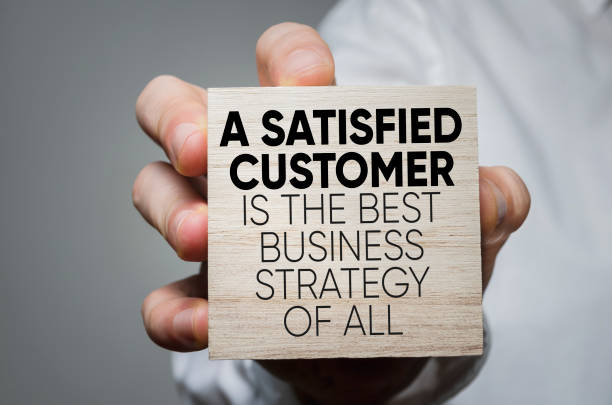 Business strategy A Satisfied Customer Is The Best Business Strategy of All testimonial stock pictures, royalty-free photos & images