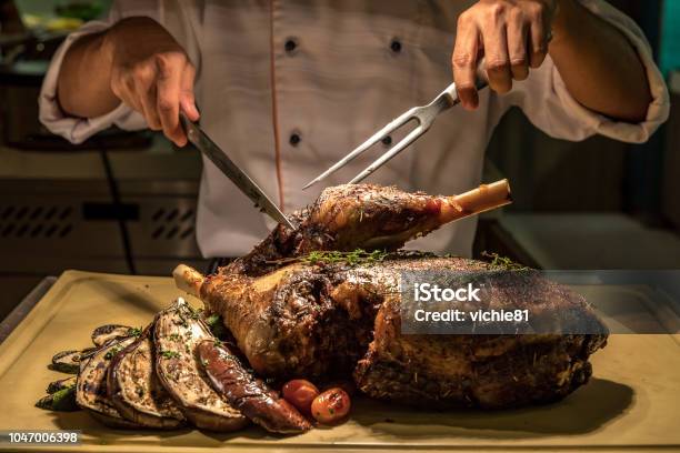 Carving Lamb Stock Photo - Download Image Now - Carving Set, Beef, Baked