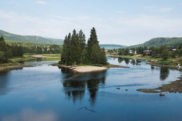 istock small island with fir trees on river, Trysil, Norway's largest ski resort 1047006520