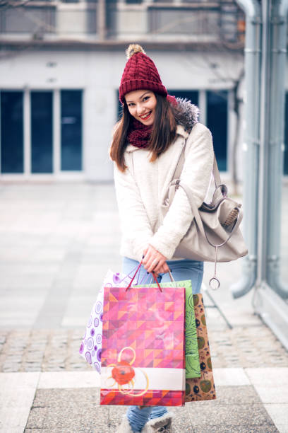 istock Woman with shopping bags 1047006540