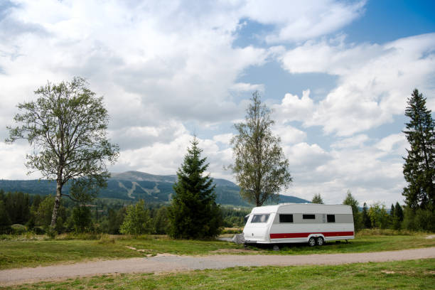 istock parked trailer near mountains in Trysil, Norway's largest ski resort 1047006590