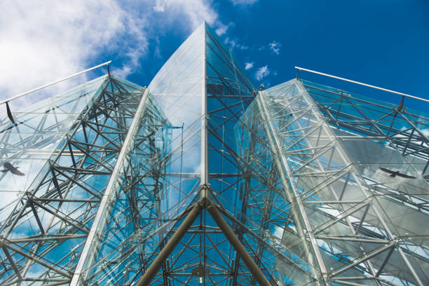 istock glass cathedral facade against blue cloudy sky, Hamar, Hedmark, Norway 1047007292