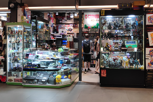 Bangkok, Thailand - September 19 2018: Antique shop on the 6 floor of MBK (a shopping mall in the city center) specialised ob selling retro consoles and video games. This shop opened for decades is a must go for any retro-games fans.