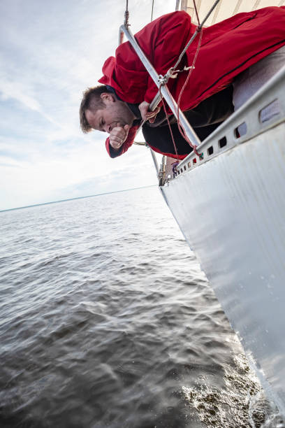 istock A man suffers from seasickness while walking on a yacht. 1047013712