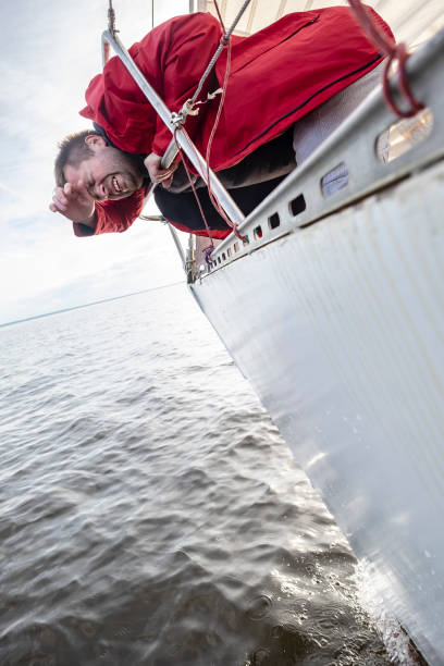 istock A man suffers from seasickness while walking on a yacht. 1047013738