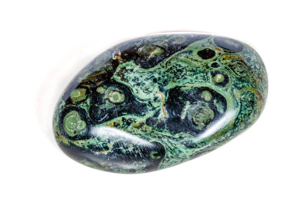 istock Macro mineral stone jasper kambaba on a white background 1047016558