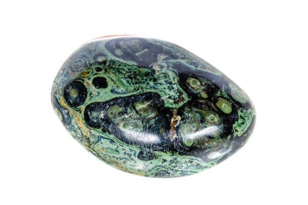 istock Macro mineral stone jasper kambaba on a white background 1047016576
