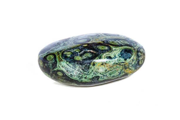 istock Macro mineral stone jasper kambaba on a white background 1047016982