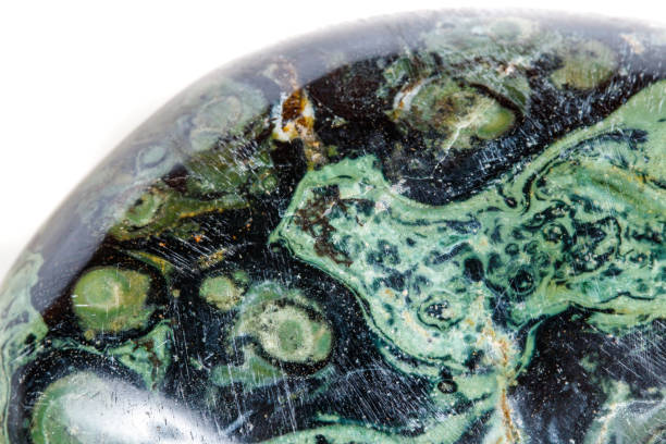 istock Macro mineral stone jasper kambaba on a white background 1047017094