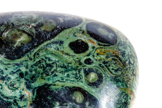 istock Macro mineral stone jasper kambaba on a white background 1047017120