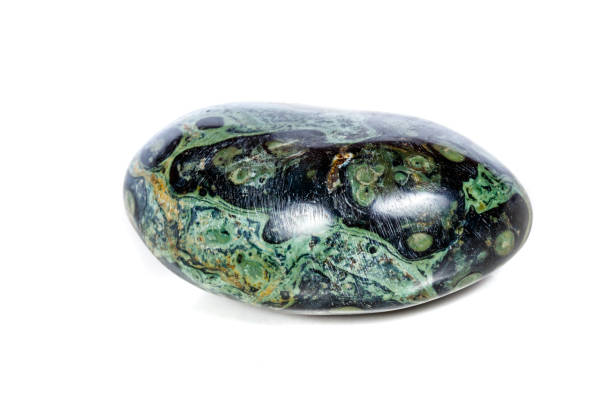 istock Macro mineral stone jasper kambaba on a white background 1047017234