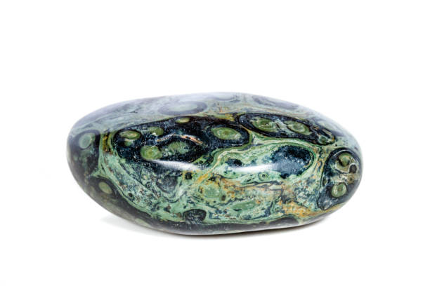 istock Macro mineral stone jasper kambaba on a white background 1047017292