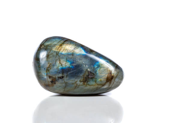 istock Macro mineral stone Labradorite on white background 1047017304