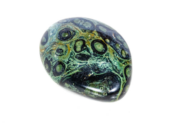 istock Macro mineral stone jasper kambaba on a white background 1047017626
