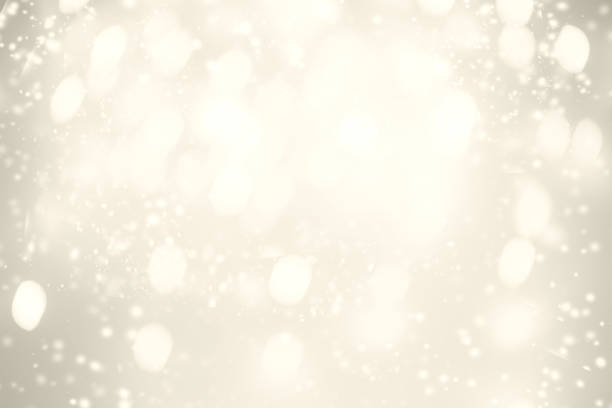 istock Gold Festive Christmas background. Abstract twinkled bright background with bokeh defocused golden lights and stars 1047017722