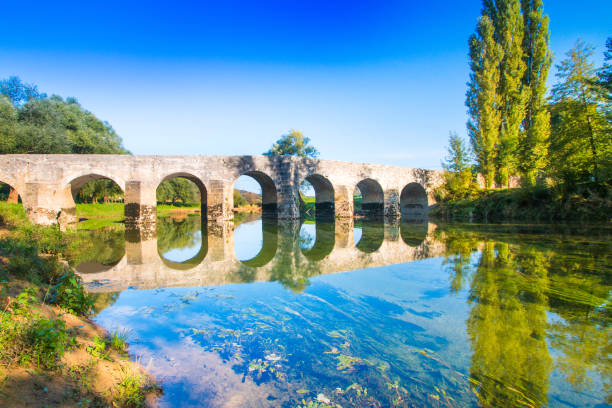 Old stone bridge river Dobra, Croatia