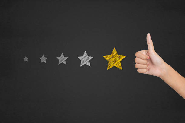 istock Customer satisfaction survey concept. Thumb up pointing at positive five star feedback. 1047024168
