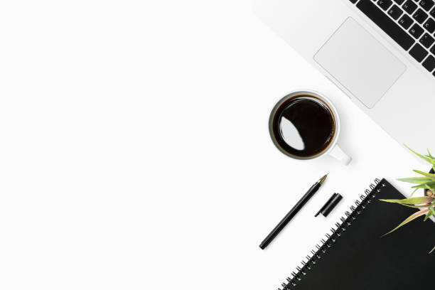 istock White office desk table with a lot of things on it. Top view with copy space, flat lay. 1047027626