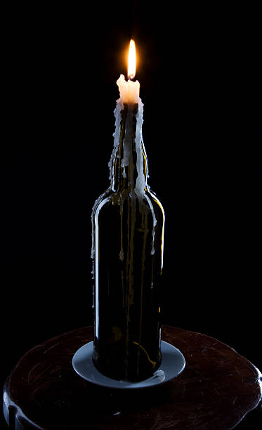 istock candle burns in the bottles 104703014