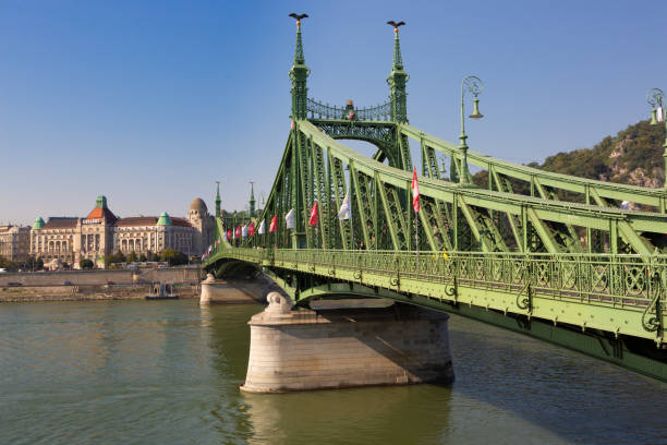istock Freedom bridge over the Danube river in Budapest. In the background the Gellert Baths. 1047030722