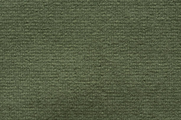istock Adorable fabric texture in strict colour. Great green fabric background. 1047030982