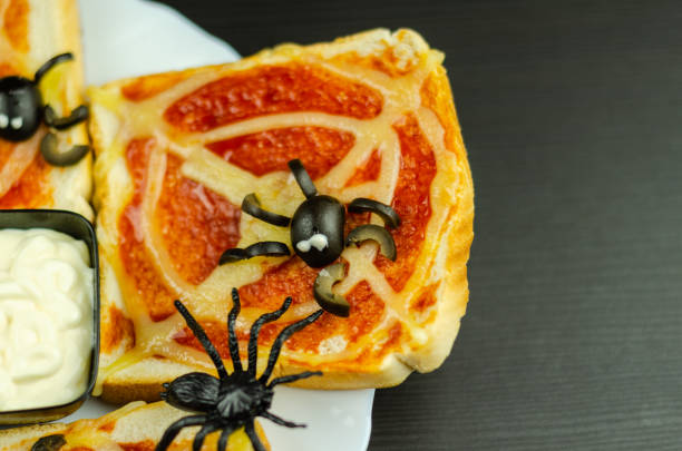 istock Funny sandwiches with  spider and  spider web for Halloween party 1047031090