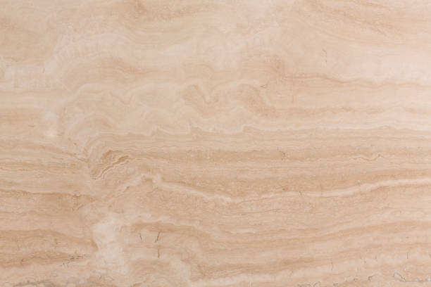 istock Fresh travertine texture in new light color. 1047031674