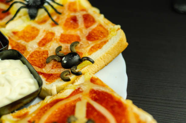 istock Funny sandwiches with  spider and  spider web for Halloween party 1047034600