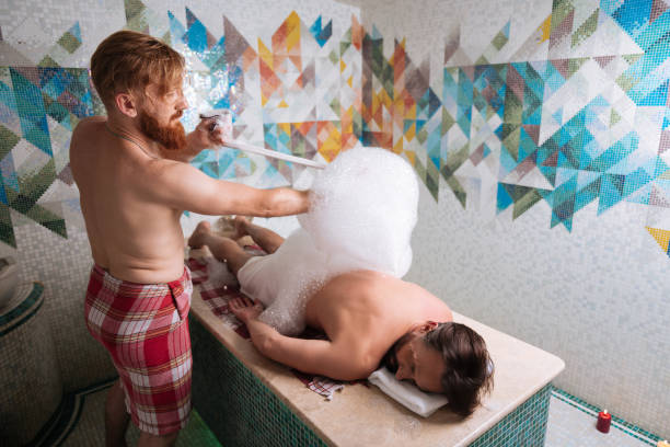 istock Nice red haired bearded man doing his job 1047034822