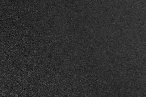 Black learter texture on macro. High resolution photo.