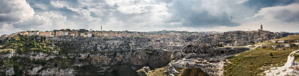 istock Tourists watching the Sassi di Matera from the opposite hill 1047035586