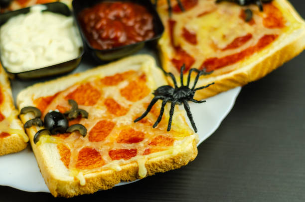 istock Funny sandwiches with  spider and  spider web for Halloween party 1047035788