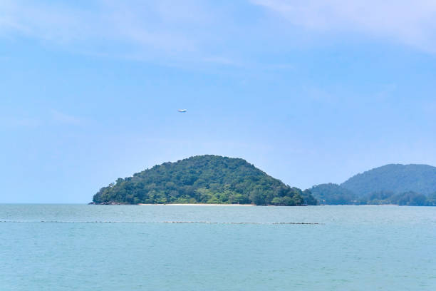 Plane is ready for landing on the tropical island