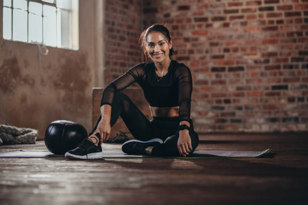 istock Woman during a break in the gym 1047038466