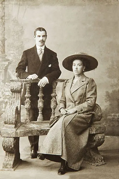 Photo of Antique photo of a woman seated and a man standing