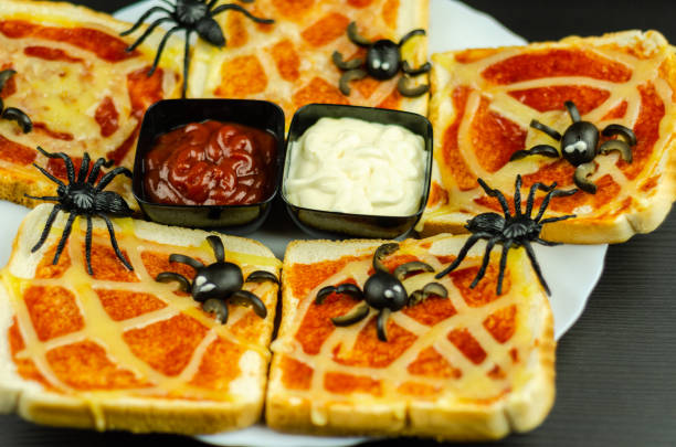 istock Funny sandwiches with  spider and  spider web for Halloween party 1047039164