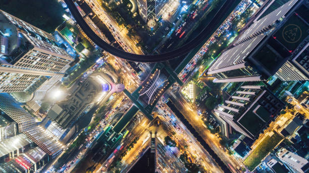 istock Highway road intersection in downtown at nigh for transportation, distribution or traffic background. 1047042502