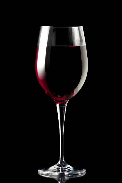 istock Glass of Wine Isolated on Black 104707870