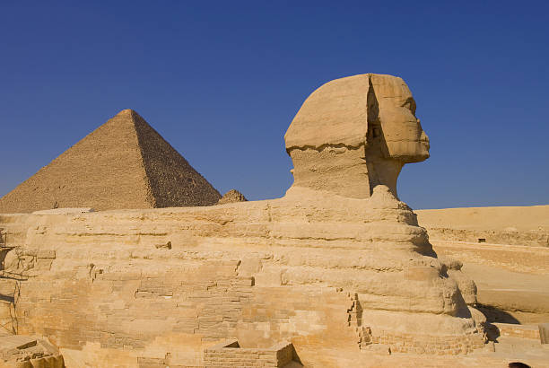 istock Sphinx and pyramid in Giza 104708160