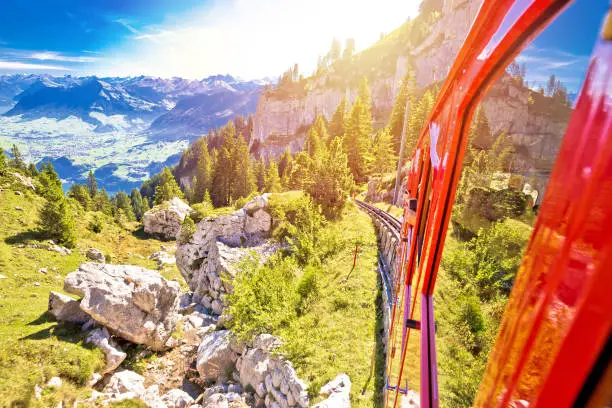 Mount Pilatus descent on worlds steepest cogwheel railway, tourist landscape of Switzerland