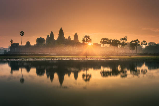 istock Sunrise view of ancient temple complex Angkor Wat Siem Reap, Cambodia 1047082838