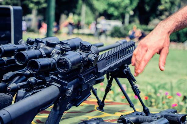istock Sniper rifle outdoor. 1047086222