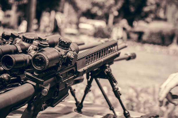 istock Sniper rifle outdoor. 1047086536